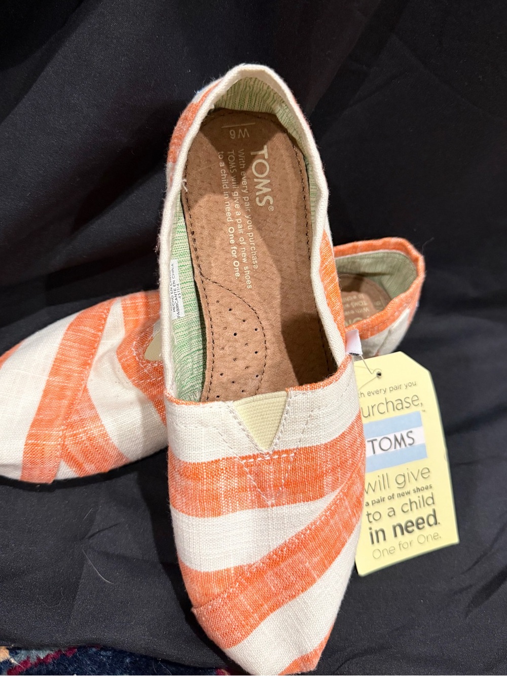 TOMS Women's Slip-On Canvas Shoes in Orange (Coral) and Cream
